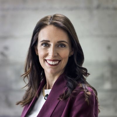 Janice is wearing a purple coat.